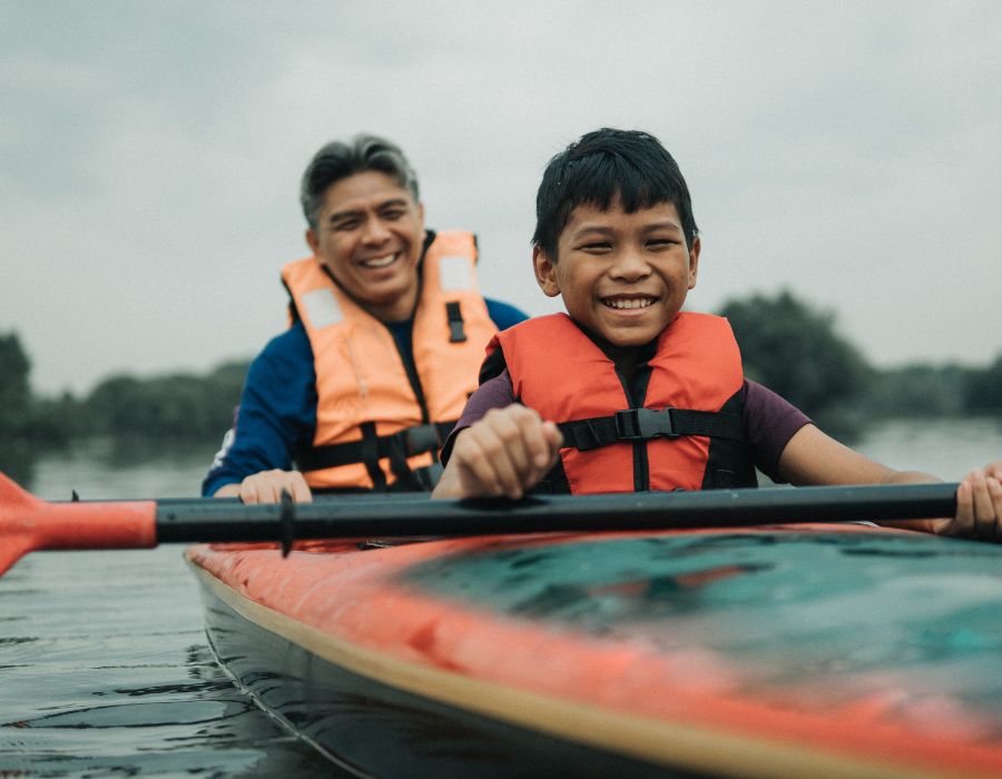 A father and son in a kayak